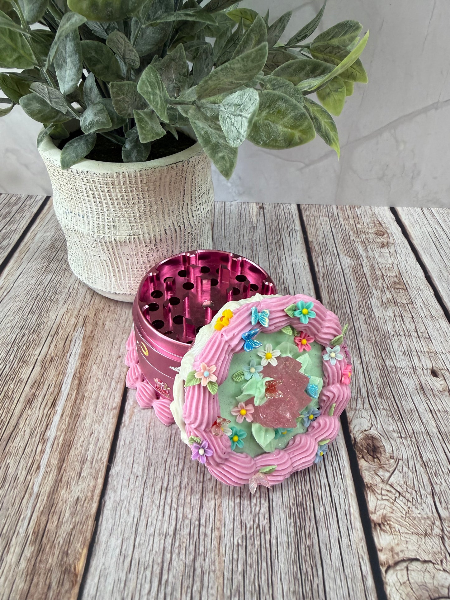 White & pink icing w/Fairy garden decor